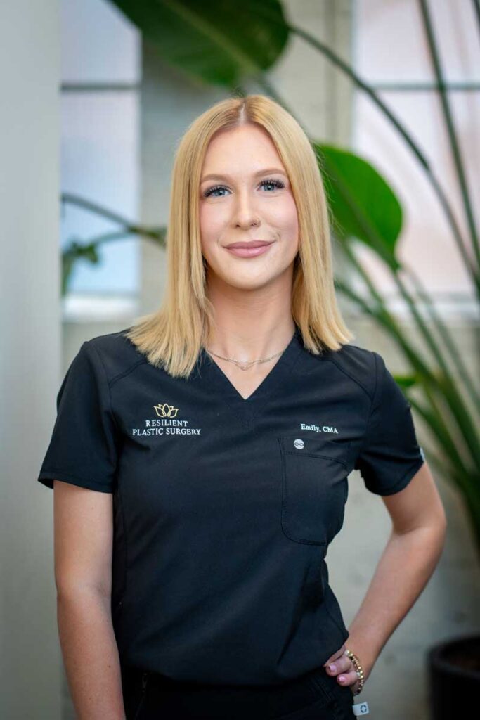 Emily Wetzel posing in scrubs